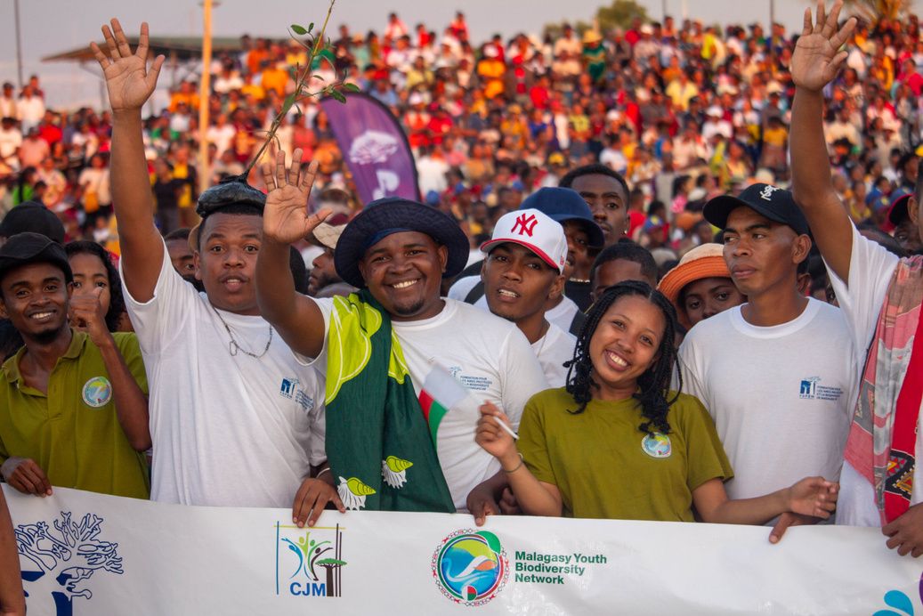 Youth with a banner outdoors